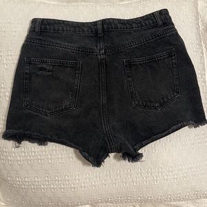 Women’s destroyed black shorts